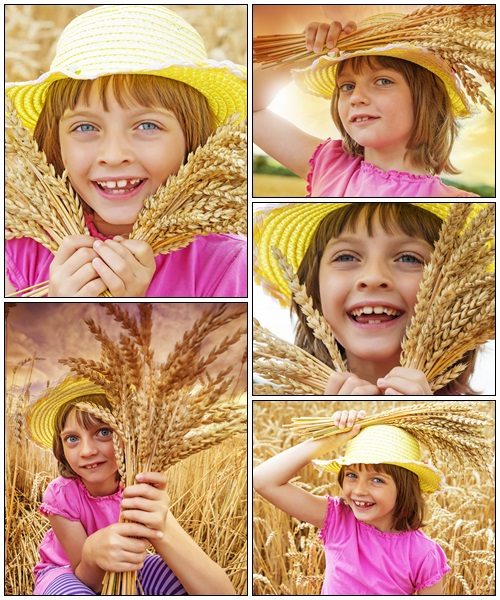 Happy little girl and wheat - Stock Photo