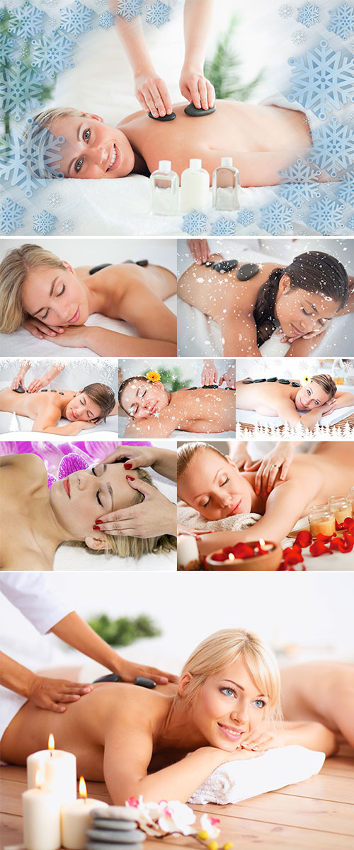 Stock Photo Delighted woman having a hot stone massage against snow